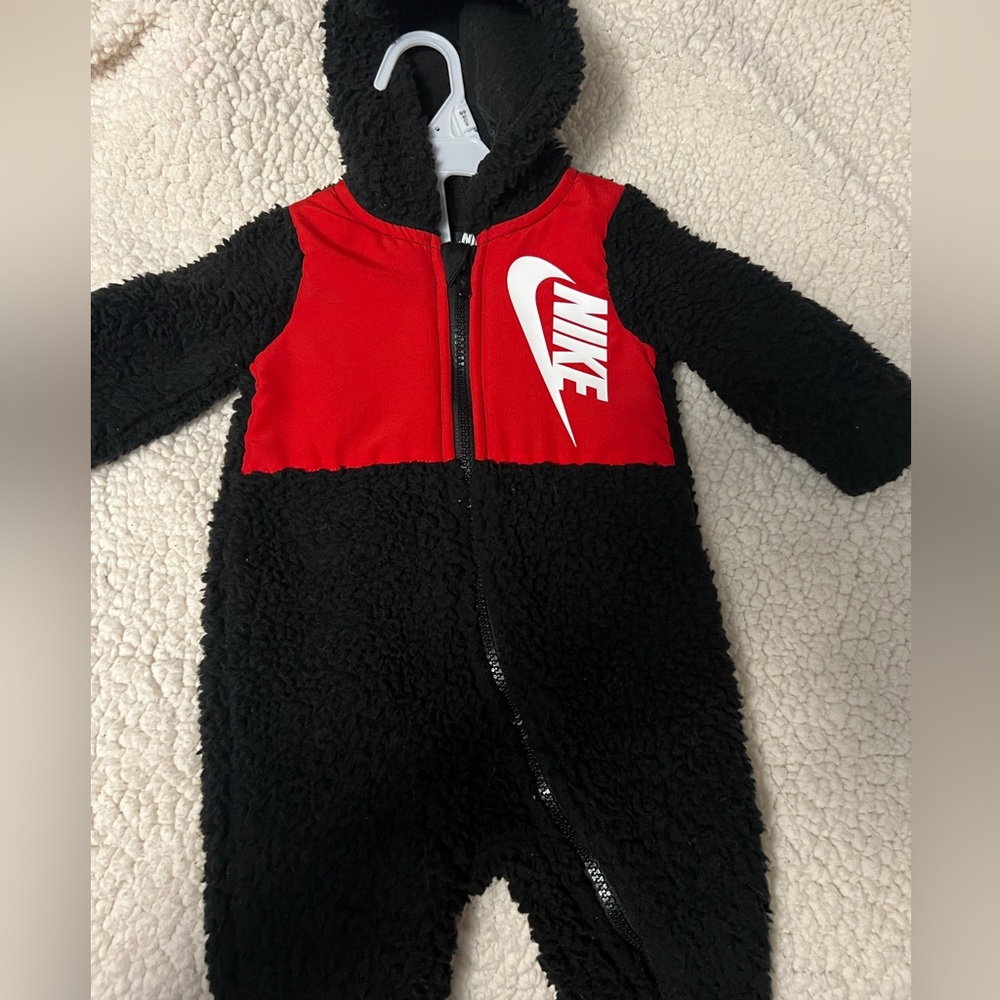 Nike fluffy onesie